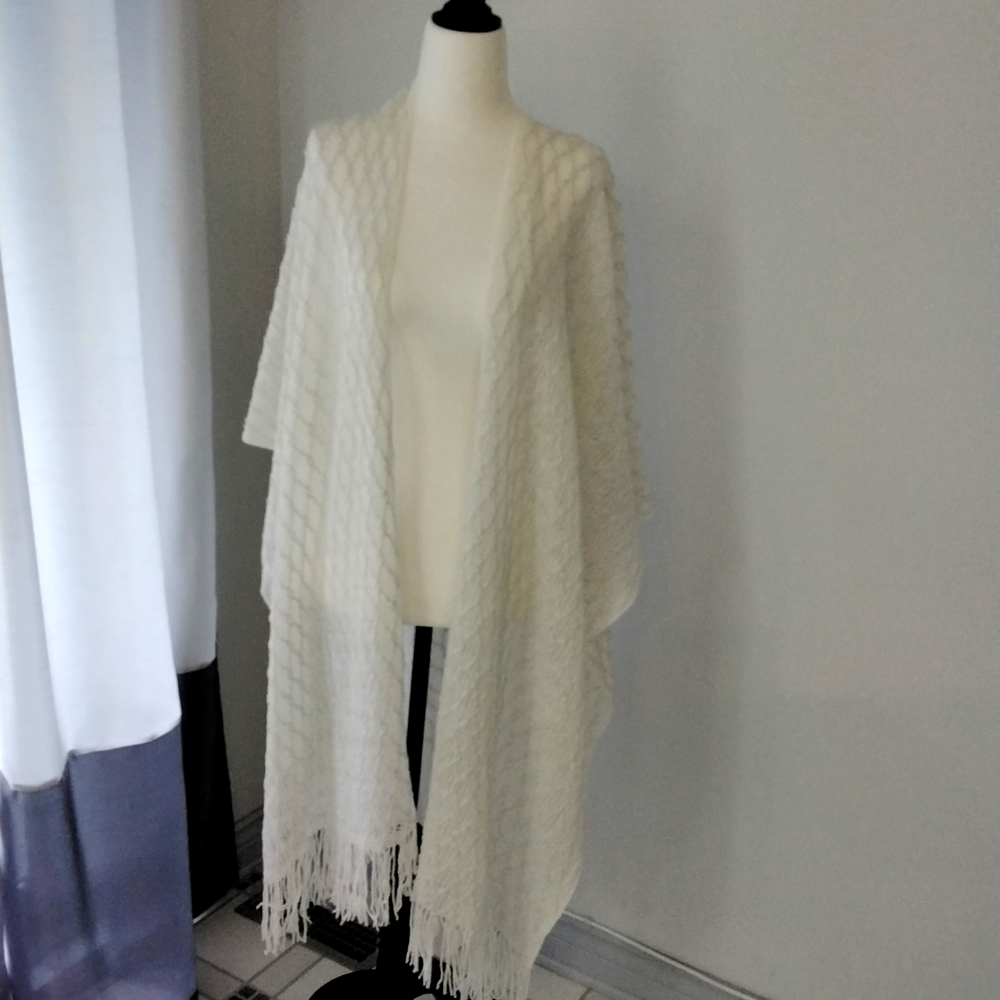 Cape shawl wrap in off white with metallic silver thread detail with fringe